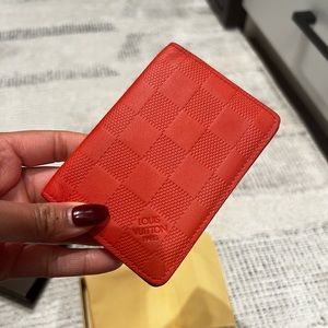 LOUIS VUITTON
Neon Damier Infini Pocket Organizer Orange